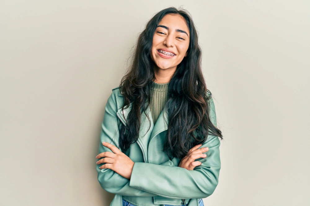 Girl considering if she needs orthodontic treatment