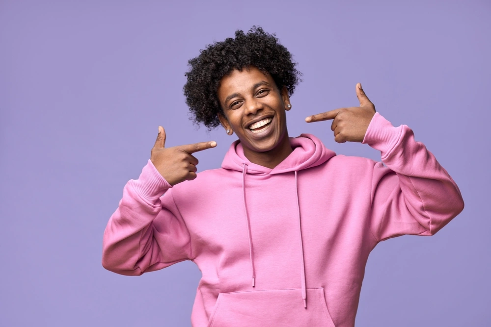 happy man with clear ceramic braces