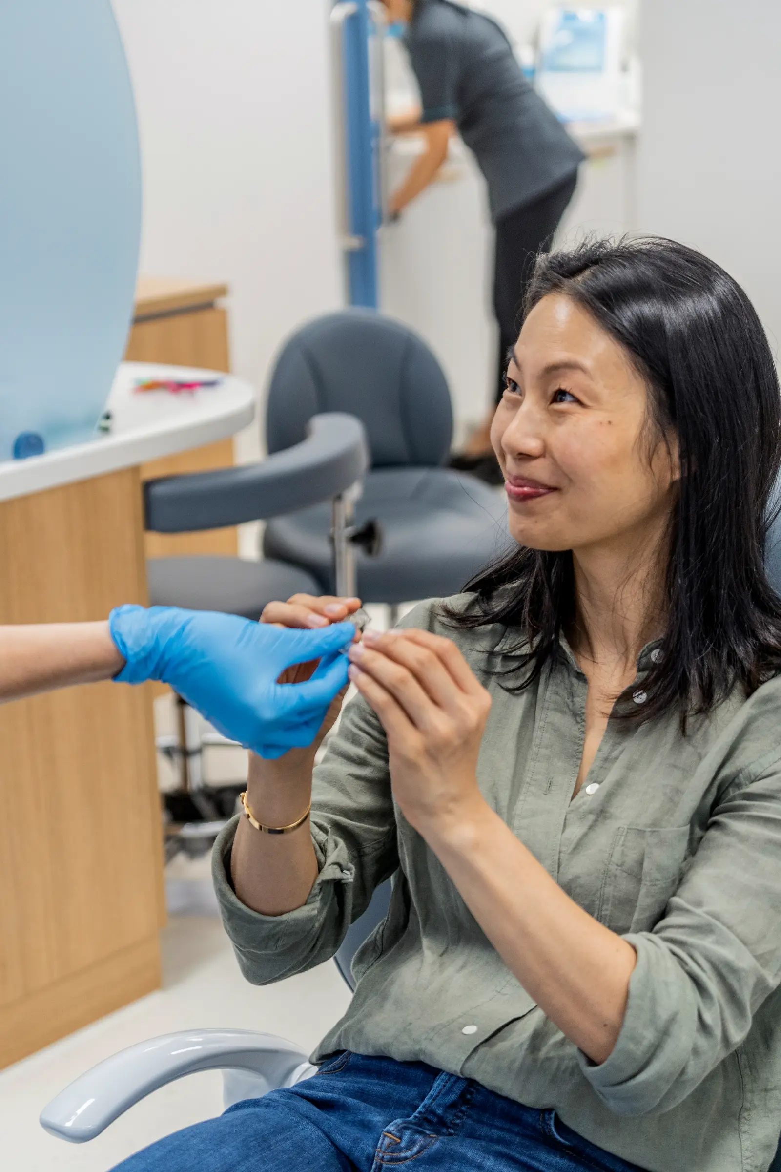 Patient at MP Orthodontics receiving Invisalign Aligner treatment in Melbourne