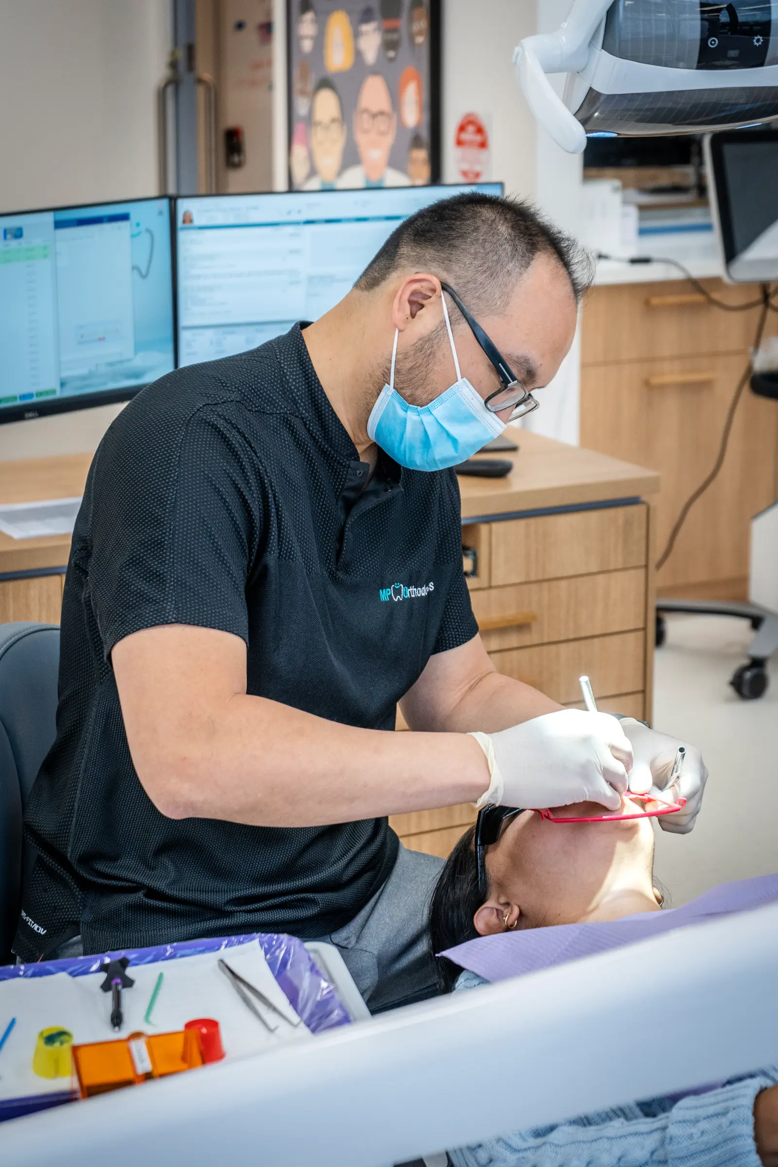 Dr Martin Poon providing orthodontic treatment at the Melbourne based clinic MP Orthodontics